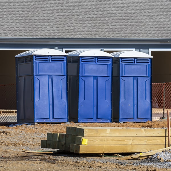 what is the cost difference between standard and deluxe portable restroom rentals in Roxbury Vermont